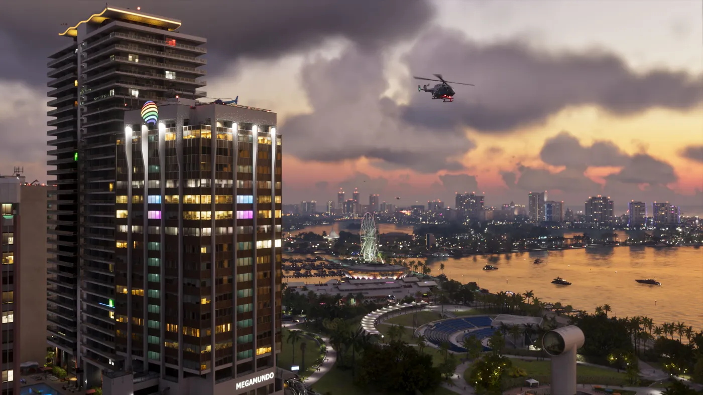 Vista de Vice City al atardecer con rascacielos y un helicóptero